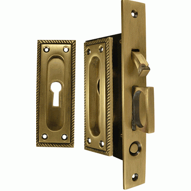 COPPER MOUNTAIN HARDWARE Georgian Square Pattern Single Pocket Privacy (Lock) Style Door Set (Antique Brass)