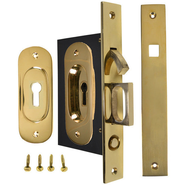 COPPER MOUNTAIN HARDWARE Traditional Oval Pattern Single Pocket Privacy (Lock) Style Door Set (Polished Brass)